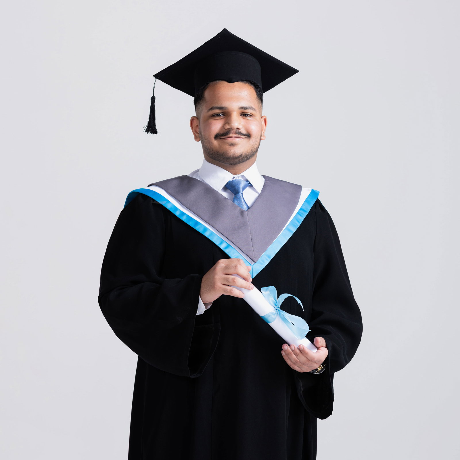 young-graduate-student-making-thumbs-up-white